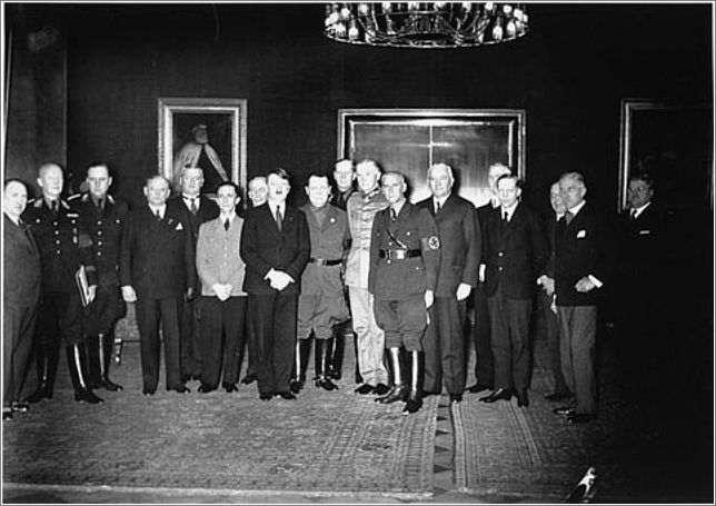 Adolf Hitler poses with members of his new government soon after his appointment as Chancellor